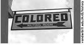 [picture: sign pointing to 'Colored Waiting Room']